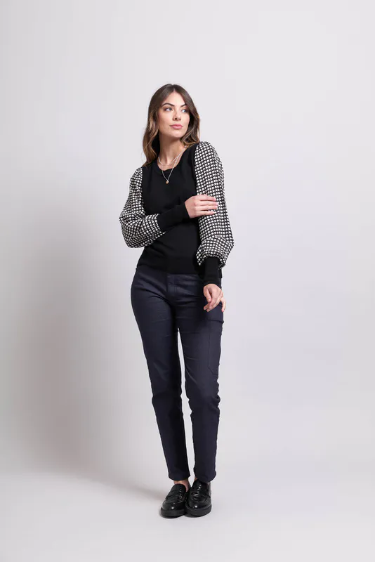 Model wearing Black/Houndstooth Coloured Sweater - Contrast Sleeve By Memo Available at Beetees Nelson