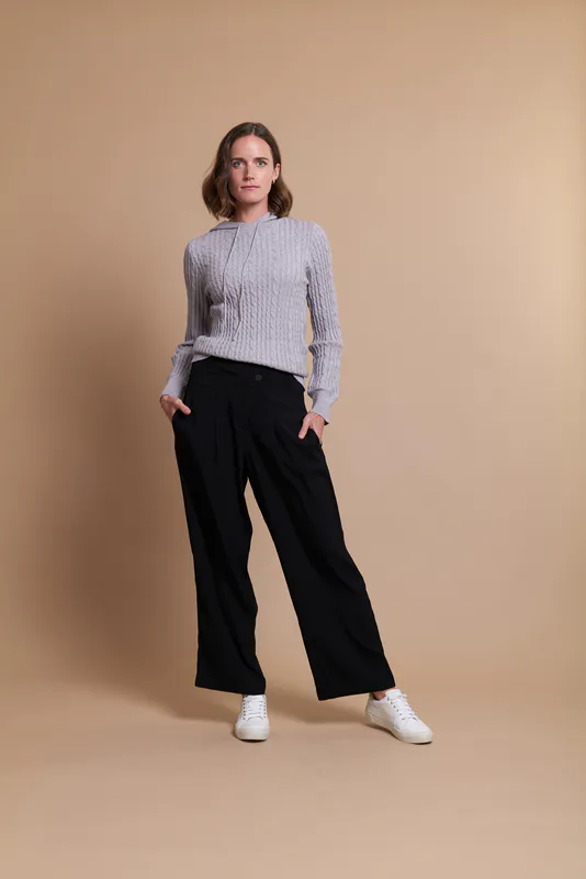 Model wearing Black Coloured Trousers - Waist Panels By Oh Three Available at Beetees Nelson