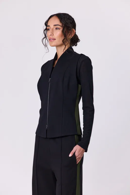 Model wearing Black Olive Batten Vest By Navy & Co. Available at Beetees Nelson