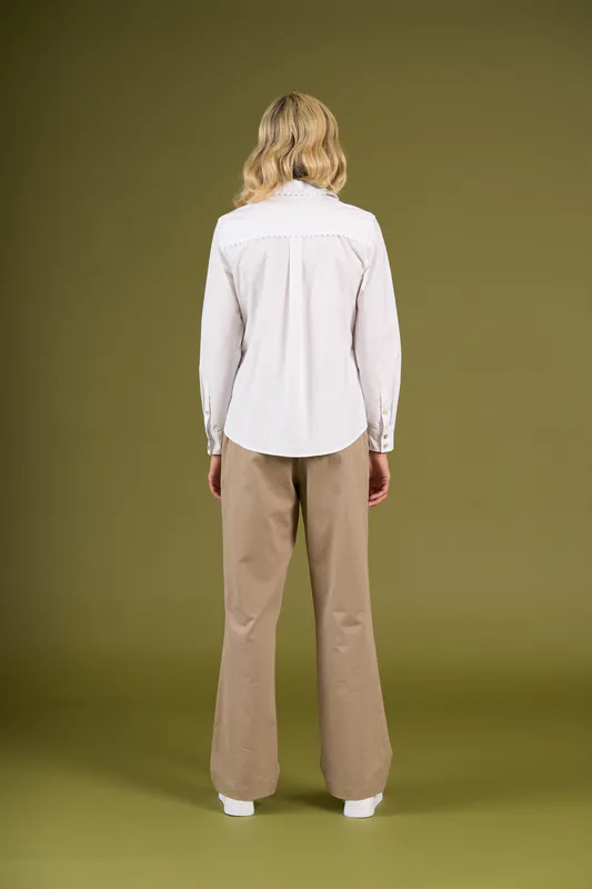 Model wearing White Levin Shirt By Charlie Jane Available at Beetees Nelson