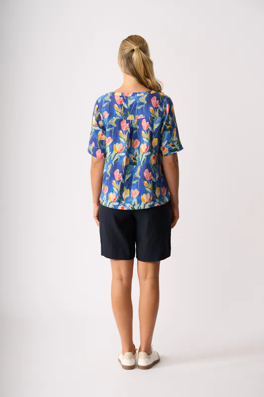 Model wearing Tropical Retreat Pleat Back Top By Foil Available at Beetees Nelson