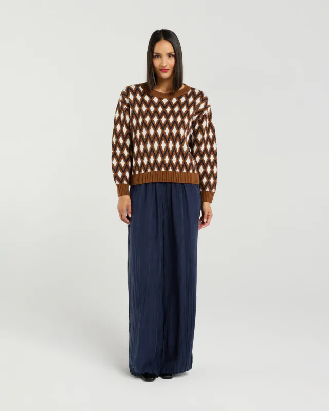 Model wearing Ink Argyle Tilda Jumper By Et Alia Available at Beetees Nelson