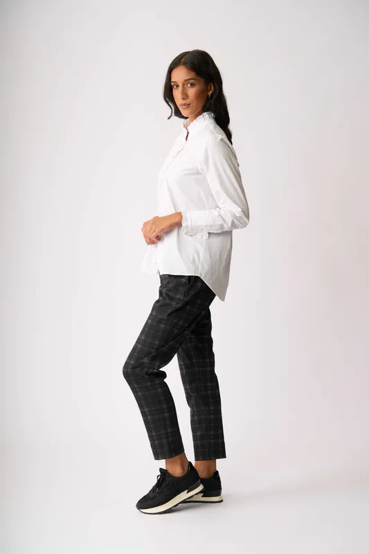 Model wearing Shadow Check Adjustable Cuff Trousers By Esplanade Available at Beetees Nelson