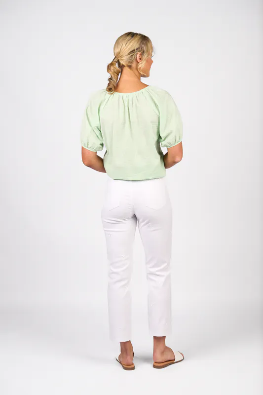 Model wearing White Denim Slim Leg Ankle Grazer Jean By Vassalli Available at Beetees Nelson