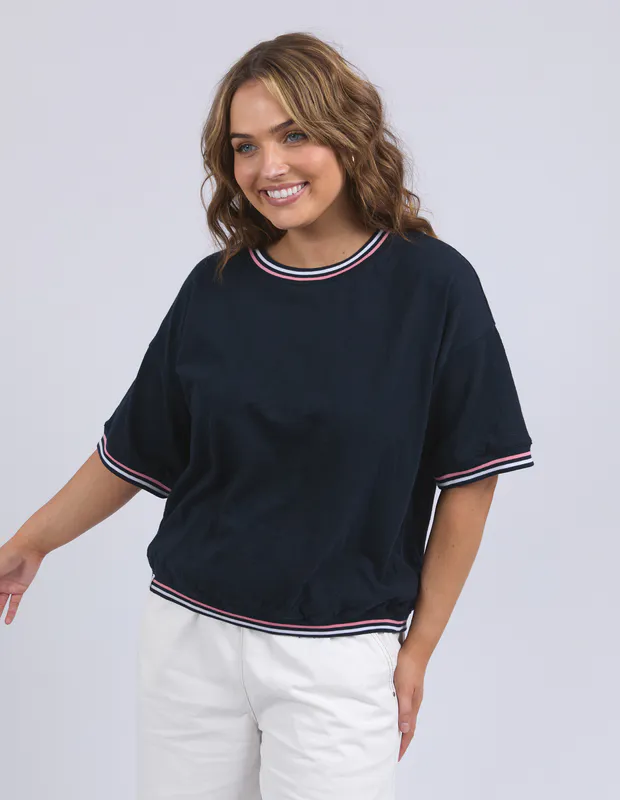Model wearing Navy Faye Short Sleeve Sweat By Elm Available at Beetees Nelson