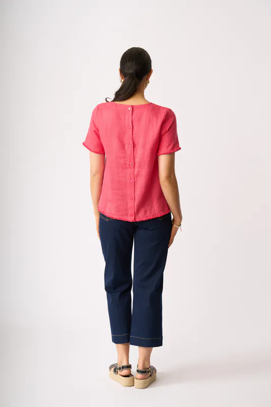 Model wearing Coral Benefits Galore Top By Foil Available at Beetees Nelson