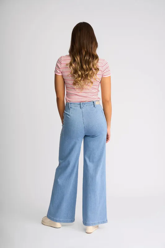 Model wearing Sky Denim Vale Jean By Knewe Available at Beetees Nelson