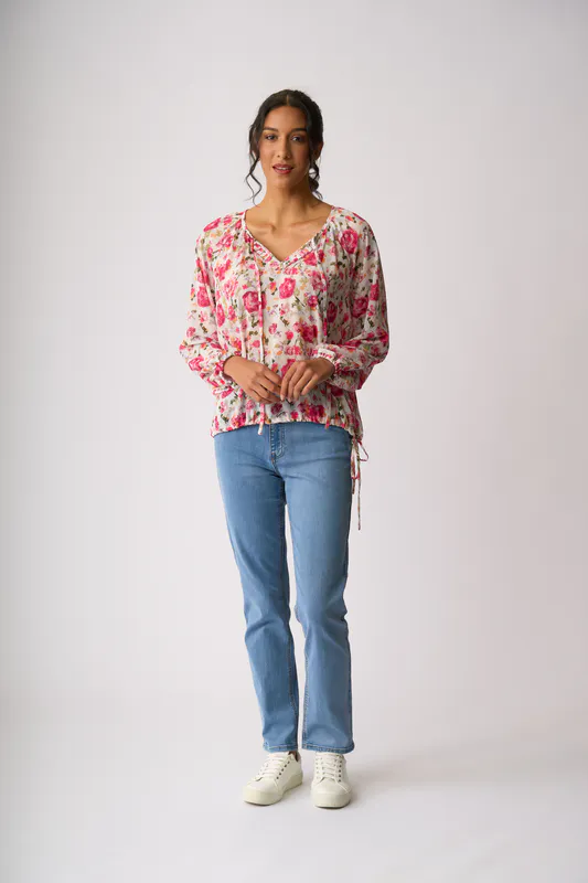 Model wearing Feminine Floral Drawcord Hem Blouse By Memo Available at Beetees Nelson