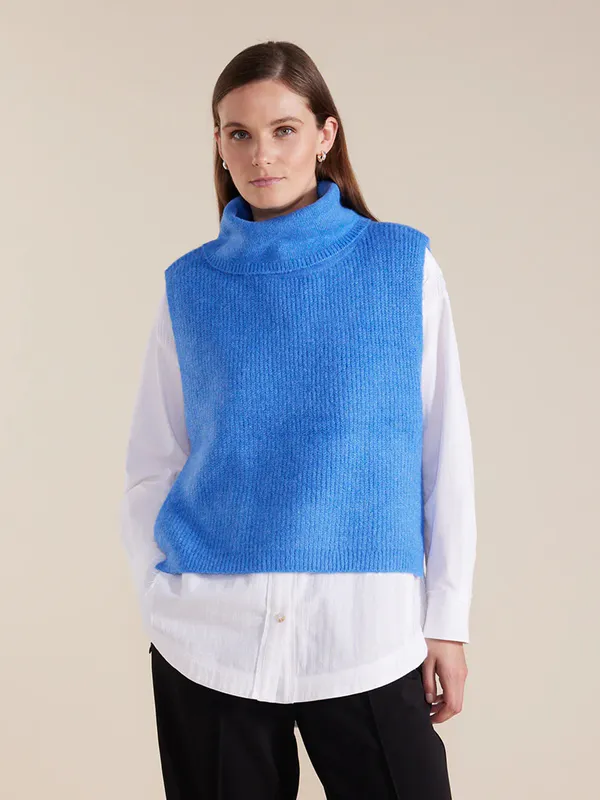Model wearing Blue Roll Neck Pull Over By Marco Polo Available at Beetees Nelson