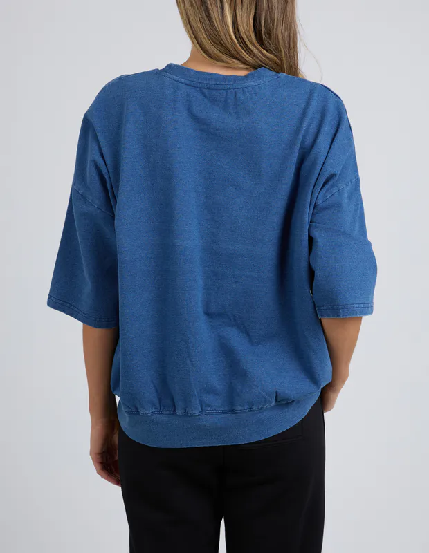 Model wearing Blue Mazie Sweat - Denim Look By Elm Available at Beetees Nelson