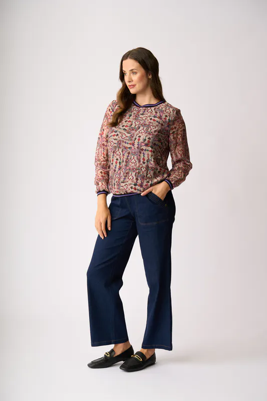 Model wearing Gems Sheer Sleeve, Rib Detail Top By Memo Available at Beetees Nelson