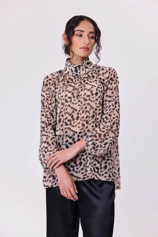 Model wearing Animal Print Bowie Blouse By Navy & Co. Available at Beetees Nelson