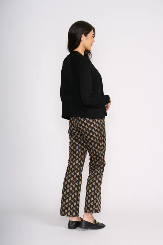 Model wearing Black High Tied Cardigan By Foil Available at Beetees Nelson