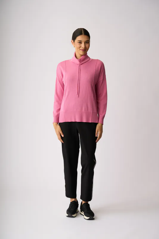 Model wearing Pink Reverse Seam Jumper By Foil Available at Beetees Nelson