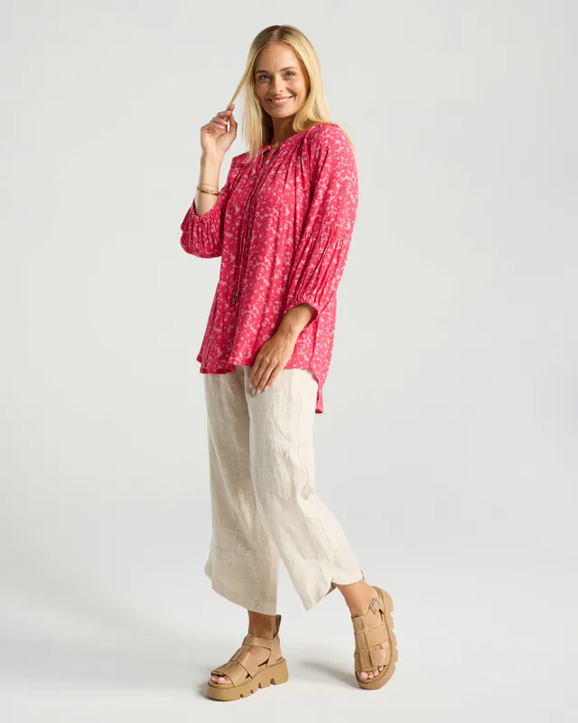 Model wearing Secret Garden Rose Sorbet Monica Gathered Sleeve Top By Blackstone Available at Beetees Nelson