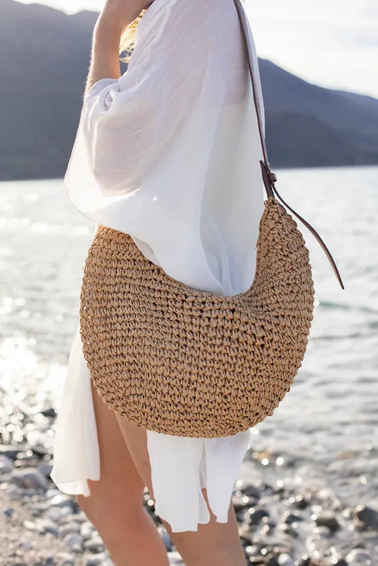 Model wearing Seaside Sling Bag By Antler NZ Available at Beetees Nelson