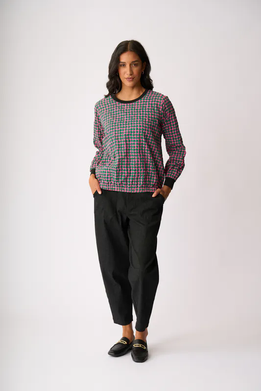 Model wearing Pink Spot Elastic Hem Detail Top By Memo Available at Beetees Nelson