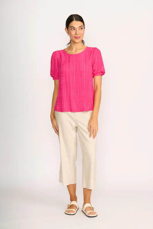 Model wearing Pink Top - Volume Sleeve, Scoop Hem By OH Three Available at Beetees Nelson