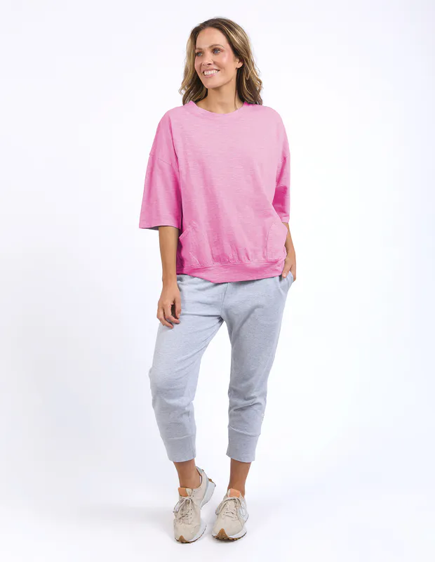 Model wearing Pink Maize Sweat By Elm Available at Beetees Nelson