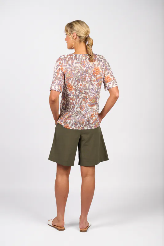 Model wearing Tuscany Round Neck Top with Elbow Length Sleeve By Vassalli Available at Beetees Nelson