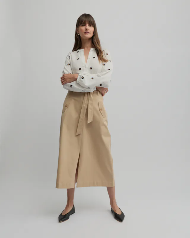 Model wearing Ecru Queens Shirt By Yarra Trail Available at Beetees Nelson