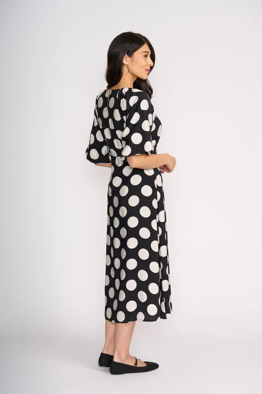 Model wearing Spot Raglan Sleeve Maxi Dress By Oh Three Available at Beetees Nelson