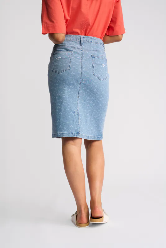 Model wearing Meadow Denim Poppy Skirt By Vassalli Available at Beetees Nelson