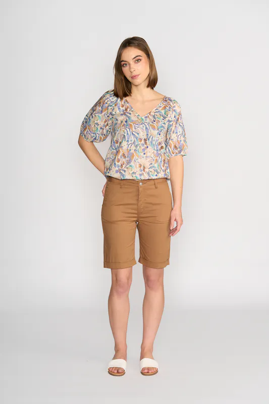 Model wearing Pecan Slim Leg Above Knee Short By Vassalli Available at Beetees Nelson