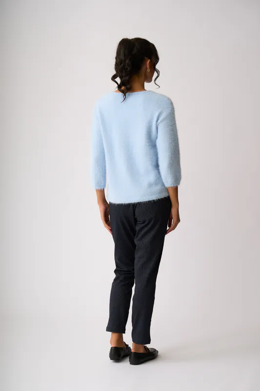 Model wearing Sky Boxy High Low Jumper By Foil Available at Beetees Nelson