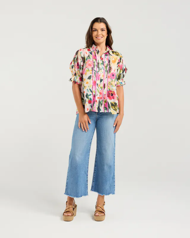 Model wearing Prime Rose Bossa Top By NMBR Rose Available at Beetees Nelson