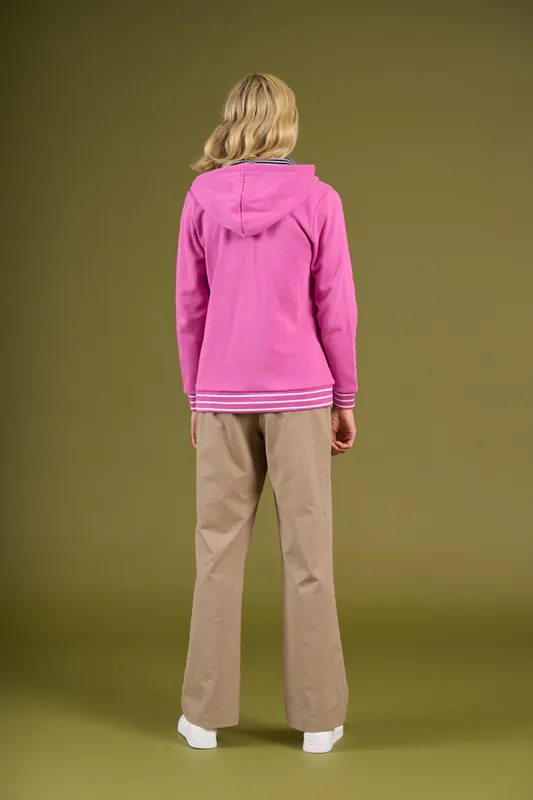 Model wearing Super Pink Dustan Zip Sweat By Charlie Jane Available at Beetees Nelson