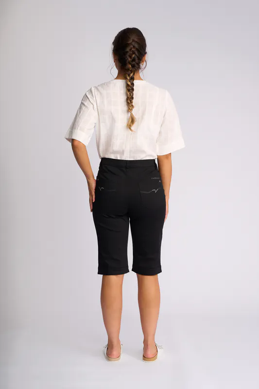 Model wearing Black Custom Poplin Short By Vassalli Available at Beetees Nelson