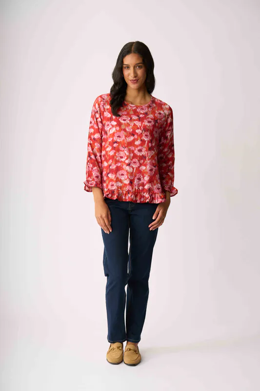 Model wearing Winter Blooms Gathered Scoop Hem Top By Preen Available at Beetees Nelson
