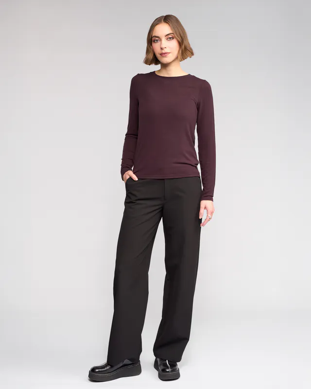 Model wearing Raisin Hero Top By Knewe Available at Beetees Nelson