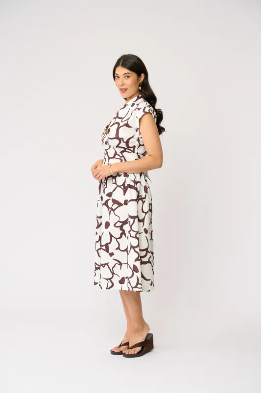 Model wearing Upsa-Daisy Gifted Dress By Foil Available at Beetees Nelson
