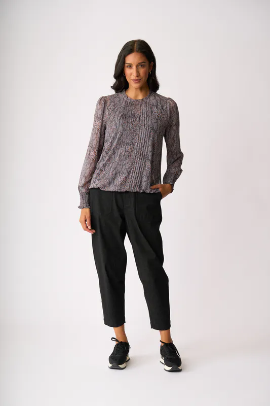 Model wearing Shadow Leopard Pintuck Front, Shirred Cuff Blouse By Memo Available at Beetees Nelson