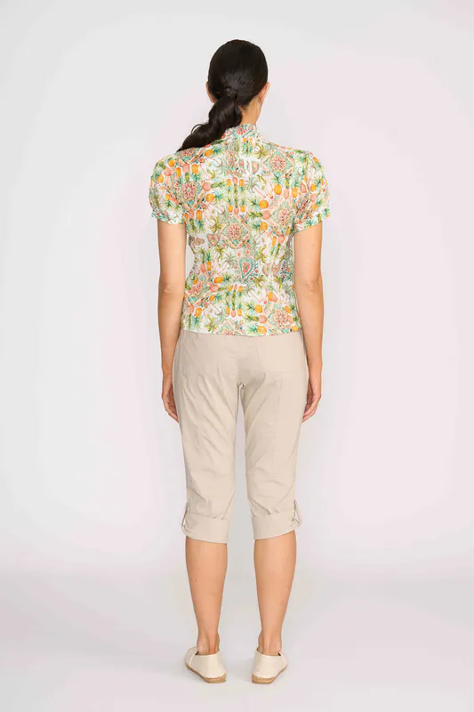 Model wearing Tutti Fruti Ultimate Crush Cap Sleeve Shirt By Foil Available at Beetees Nelson