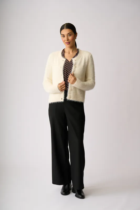 Model wearing Vanilla Fluffy Scoop Cardigan By Foil Available at Beetees Nelson