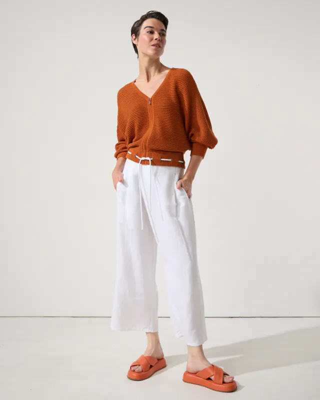 Model wearing Rust Open Knit Bomber By Marco Polo Available at Beetees Nelson