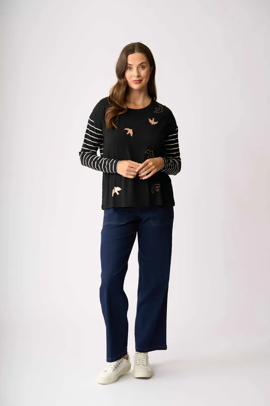 Model wearing Metallic Birds Drop Shoulder Top By Foil Available at Beetees Nelson