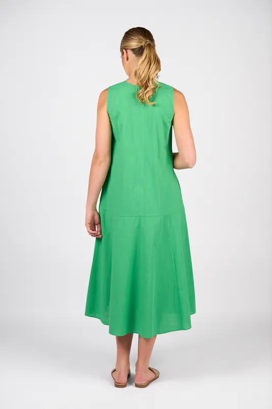 Model wearing Clover Plain Long Sleeveless Dress with Round Neck and Pockets By Vassalli Available at Beetees Nelson
