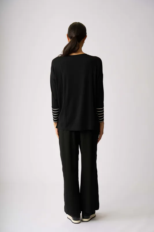 Model wearing Lucky Clover Blocked Stripe Top By Foil Available at Beetees Nelson