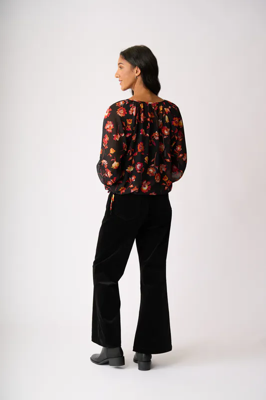 Model wearing Rust Blooms Drawcord Hem Blouse By Memo Available at Beetees Nelson