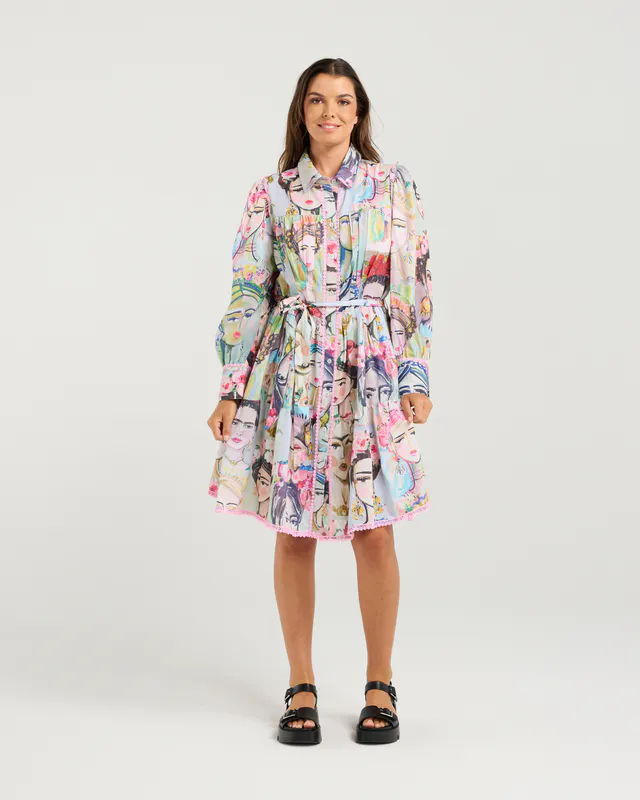 Model wearing Frida Print Amphora Dress By NMBR Rose Available at Beetees Nelson