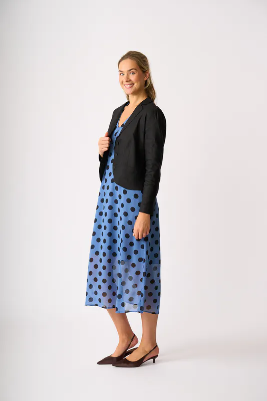 Model wearing Black Jacket - Scoop Hem Back By Oh Three Available at Beetees Nelson