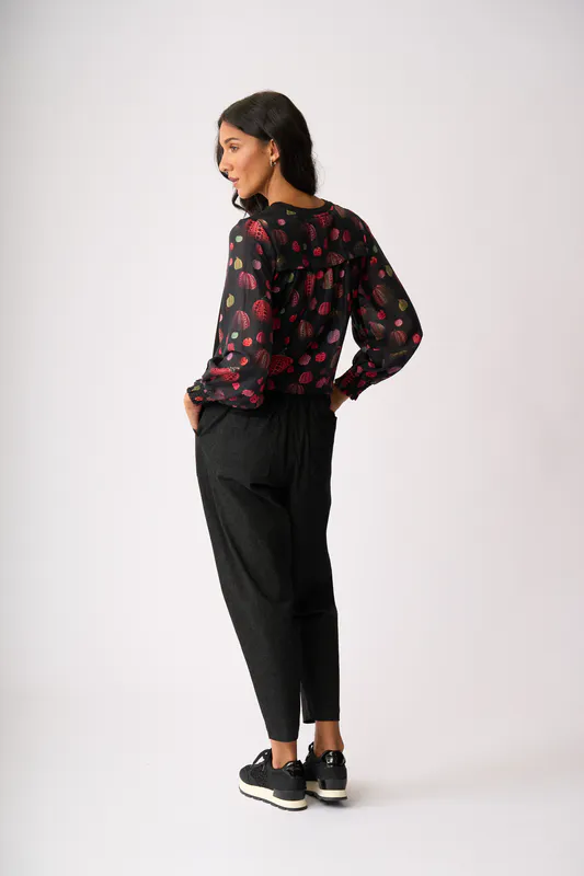 Model wearing Pumpkins Contrast Woven Top By Memo Available at Beetees Nelson