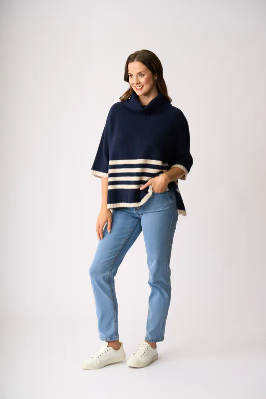 Model wearing Midnight ( Oat Stripe) Relaxed, Split Back Jumper By Memo Available at Beetees Nelson