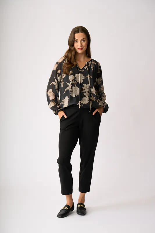 Model wearing Classic Bloom Drawcord Hem Blouse By Memo Available at Beetees Nelson