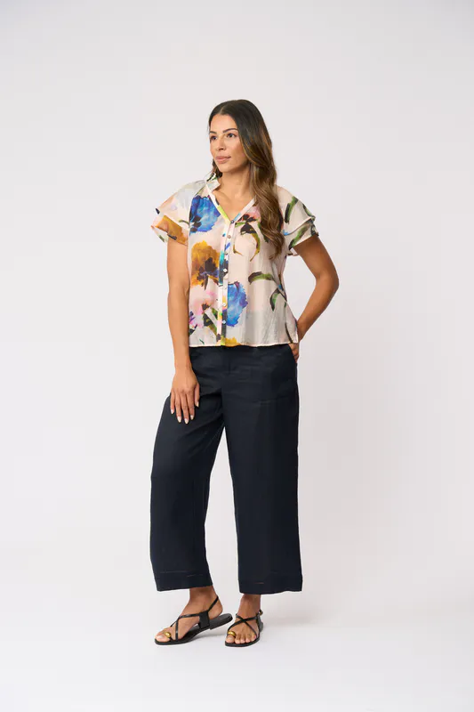 Model wearing True Navy Top Rank Trousers By Foil Available at Beetees Nelson