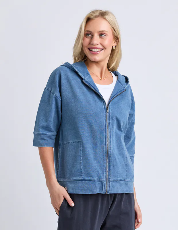 Model wearing Blue Tessa Denim Look Hoodie By Elm Available at Beetees Nelson